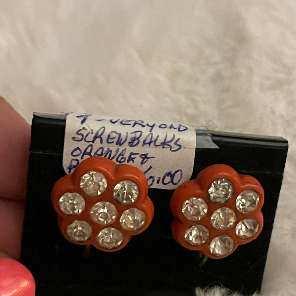 Vintage older orange and rhinestone lucite earrings screw backs